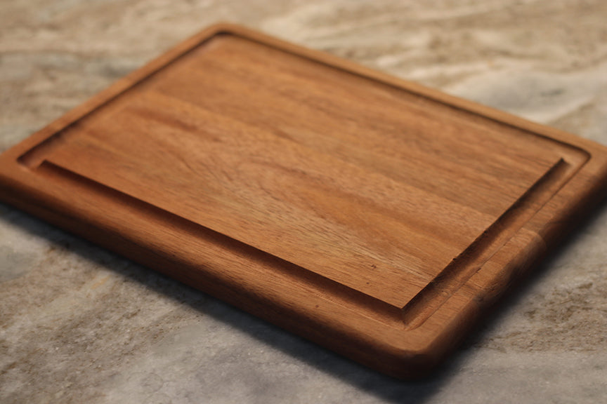custom laser engraved wood cutting board | initials monogram name brand logo engraved cutting board | Shop handmade apparel, homewares, gifts, & more at The Branded Iron. Or, contact us today for all your small business customization needs: tees, hats, cups, & more...we do it all. Proudly located in Boerne, Texas.