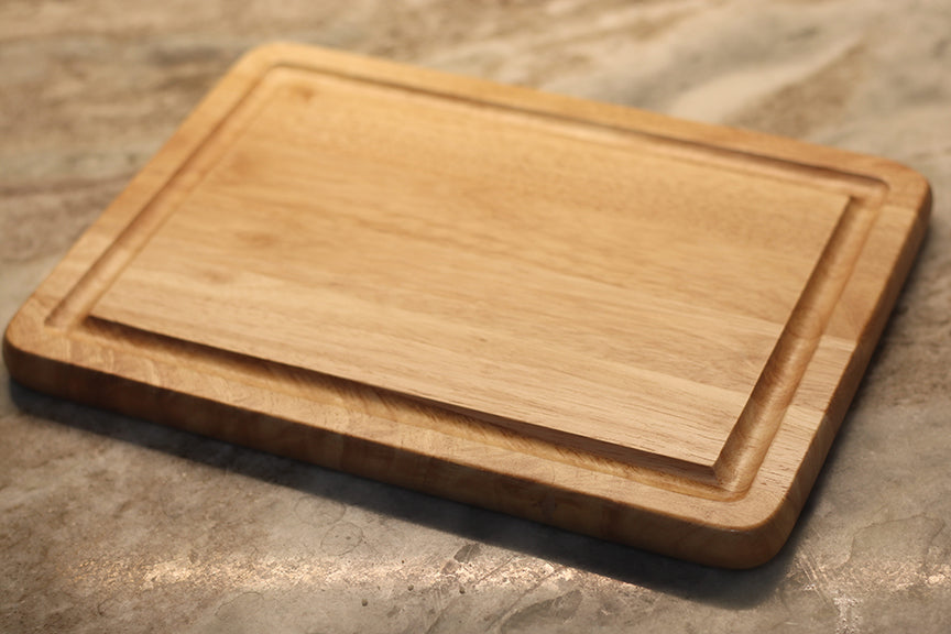 custom laser engraved wood cutting board | initials monogram name brand logo engraved cutting board | Shop handmade apparel, homewares, gifts, & more at The Branded Iron. Or, contact us today for all your small business customization needs: tees, hats, cups, & more...we do it all. Proudly located in Boerne, Texas.