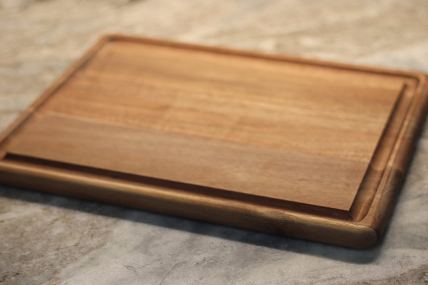 custom laser engraved wood cutting board | initials monogram name brand logo engraved cutting board | Shop handmade apparel, homewares, gifts, & more at The Branded Iron. Or, contact us today for all your small business customization needs: tees, hats, cups, & more...we do it all. Proudly located in Boerne, Texas.
