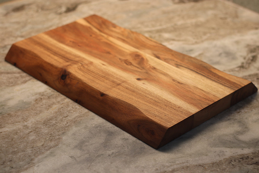 custom laser engraved wood cutting board | initials monogram name brand logo engraved cutting board | Shop handmade apparel, homewares, gifts, & more at The Branded Iron. Or, contact us today for all your small business customization needs: tees, hats, cups, & more...we do it all. Proudly located in Boerne, Texas.