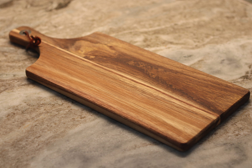 custom laser engraved wood cutting board | initials monogram name brand logo engraved cutting board | Shop handmade apparel, homewares, gifts, & more at The Branded Iron. Or, contact us today for all your small business customization needs: tees, hats, cups, & more...we do it all. Proudly located in Boerne, Texas.
