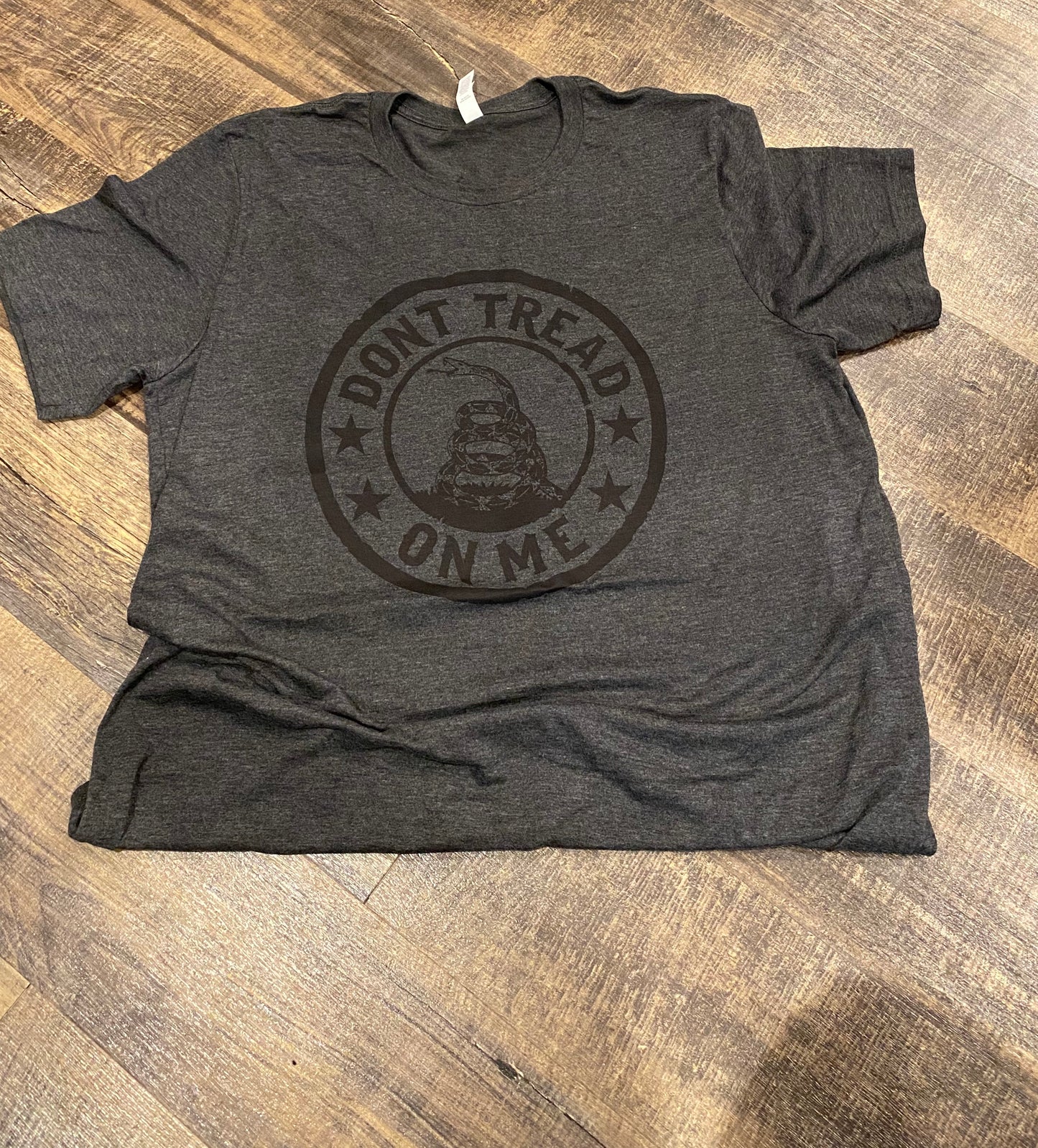 Gadsden flag don't tread on me screen printed tee shirt | Shop handmade apparel, homewares, gifts, & more at The Branded Iron. Or, contact us today for all your small business customization needs: tees, hats, cups, & more...we do it all. Proudly located in Boerne, Texas.