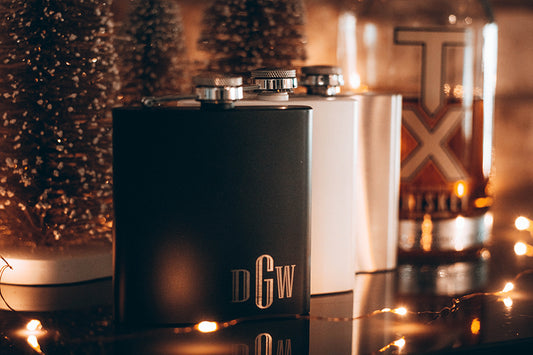 custom engraved flasks in three colors | Shop handmade apparel, homewares, gifts, & more at The Branded Iron. Or, contact us today for all your small business customization needs: tees, hats, cups, & more...we do it all. Proudly located in Boerne, Texas.